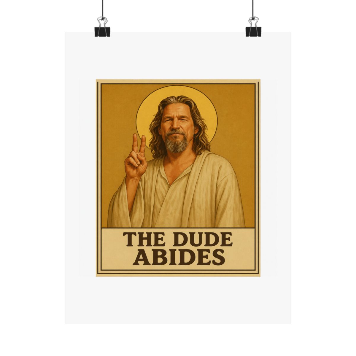 Framed poster depicting a man with long hair and a beard, dressed in a robe, giving a peace sign. A golden halo is behind him. The text "THE DUDE ABIDES" is at the bottom of the poster - alternate angle 4, merchandise